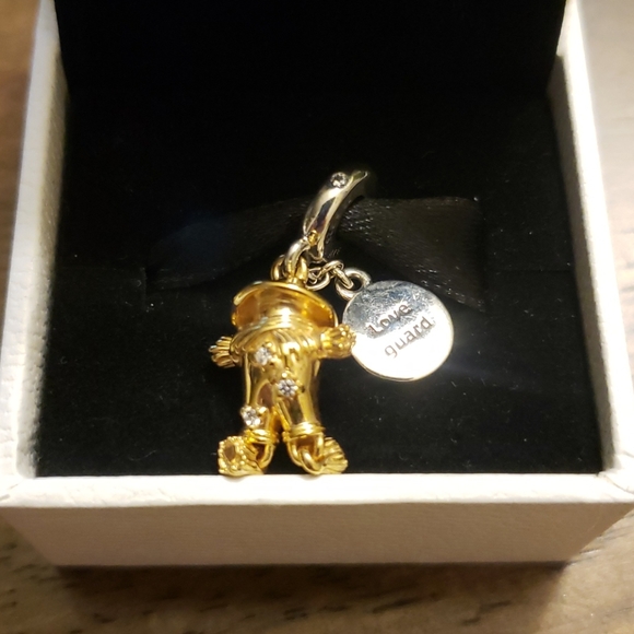 18 kt gold plate Pandora love guard scarecrow .